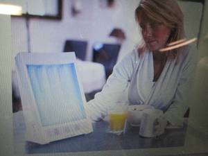 lot 115 image: SunTouch Plus Light and Ion Therapy...