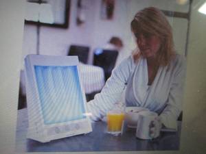 lot 116 image: SunTouch Plus Light and Ion Therapy...