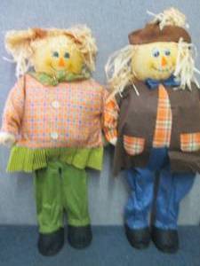 lot 156 image: Set of 34 inch Man & Woman Fall Sca...