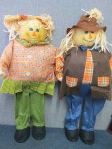 lot 157 image: Set of 34 inch Man & Woman Fall Sca...