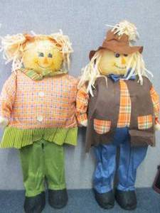 lot 161 image: Set of 34 inch Man & Woman Fall Sca...