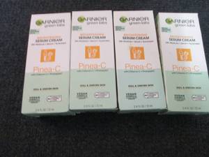 lot 168 image: 4- 2.4 oz Garnier Brightening Serum...