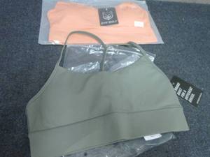 lot 304 image: 2 Large Gym Wolf Sports Bras...