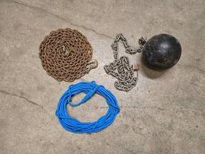 lot 14 image: 20 6 metal chain with hook, ball and chain and a long blue extension cord