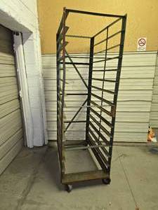 lot 34 image: 7 ft tall rolling metal rack