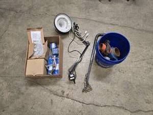 lot 44 image: Box of misc plumbing  shower items, adjustable lamp (works), distribution hitch and a bucket of steel fittings