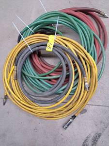 lot 75 image: 3 rolls of Air Hose #84