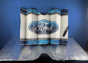 lot 141 image: Two Windshield Visors Ford and Silver