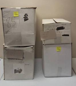 lot 61 image: Plastic Chair & Sofa Covers  4 Open Boxes (2 Boxes of Chair Covers & 2 Boxes of Sofa Covers)