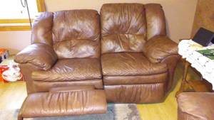 Leather Reclining Loveseat.