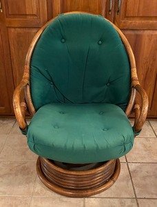 lot 24 image: Swivel Rattan Rocking Chair