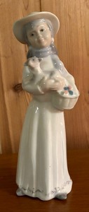 lot 155 image: Girl Holding a Lamb Figurine by Tengra