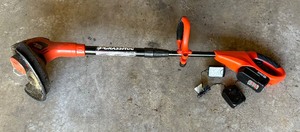 lot 216 image: Black & Decker NST2018 Grass Hog Trimmer with Battery and Charger