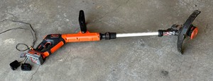 lot 219 image: Black & Decker LSTE523 Trimmer with Battery and Charger