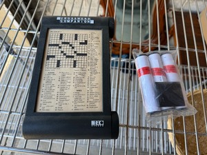 lot 51 image: Crossword Companion with Three Rolls of Additional Puzzles - Sharpen your mind and your pencil