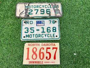 ND Motorcycle Plates & 1977 Snowmobile Sticker (Unused)