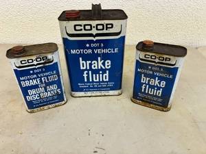 Co-op Brake Fluid Metal Cans (All over Half Full)