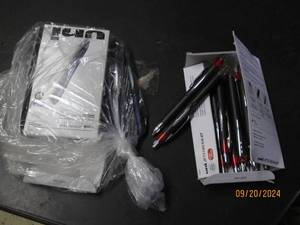 lot 63 image: lot f blue and red pens...