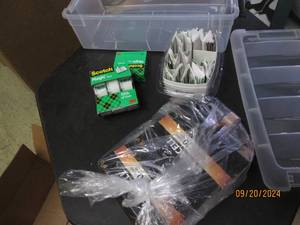 lot 125 image: band aids , tape and batteries in a...