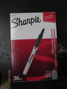 lot 142 image: package of 36 sharpies...