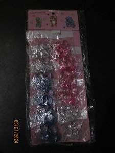 lot 248 image: 12 hair pony tail holders...