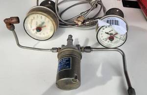 lot 538 image: Palmer Thermometer  AC Spark Plug