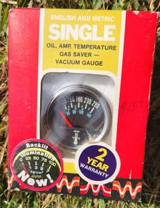 lot 554 image: Single Oil, Amp, Temperature Gas saver Vacuum Gauge