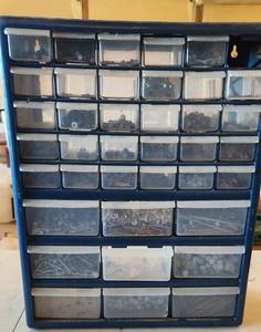 lot 694 image: Container full of Hardware Nails