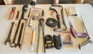 lot 753 image: Sears Drill, Key Hole Saws, 100ft Measure,  Craftsman Nail Puller,  Pliers, Wrenches, Hole Punch, Drill Bits