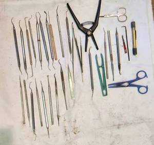 lot 46 image: Tool lot of Tweezers and Dental Pick Sets