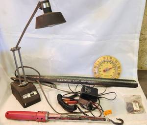 lot 83 image: Thermometer,  Battery Charger, Craftsman Light, Transformer Power Desk Lamp, Shoe Horn