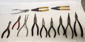 lot 105 image: Needle Nose Pliers, Wire Strippers, Regular Pliers