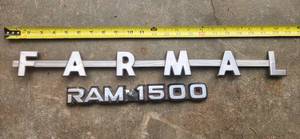 lot 246 image: 22 FARMALL Metal Emblem Sign RAM Plastic