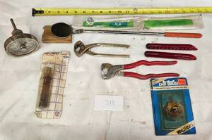 lot 319 image: Klein Pliers replacement handles Telescopic mirror, Thermometer,  Tile Nippers