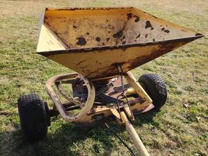 lot 486 image: HUGE Yellow Metal Fertilizer Spreader