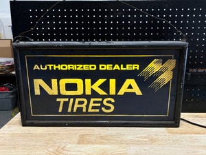lot 8 image: Two Sided Lighted Nokia Tires Sign