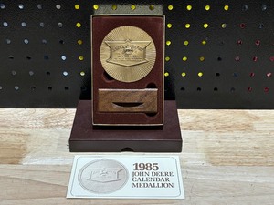 lot 60 image: John Deere Brass Calendar 1985