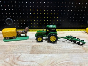 lot 67 image: John Deere Tractor & Plow and 1990 Byron Mold