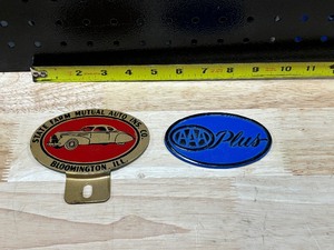 lot 70 image: Vtg State Farm License Plate Topper & AAA Automobile Badge