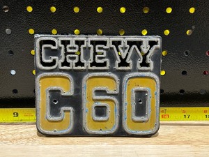 lot 83 image: 1970s Chevy C60 Metal Emblem