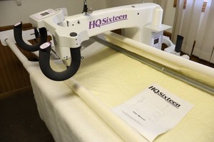 lot 1 image: HQSixteen Long-Arm Quilting Machine wAccessories