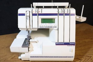 lot 26 image: Husqvarna Viking Huskylock 936 Overlock Serger Sewing Machine