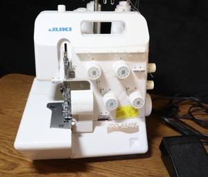 lot 28 image: Juki Serger The MO-654DE has Differential Feed and Built-in Rolled Hemming