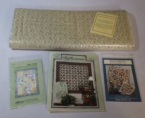 lot 36 image: Quilting Patterns wBulk Fabric Bolt