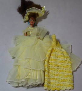 lot 50 image: 1966 Twist-and-Turn Barbie Mattel Blonde Malaysia Yellow Sheer and Yellow Crocheted Dress