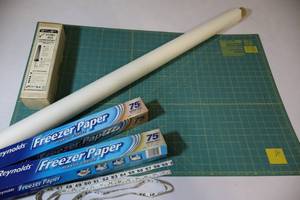 lot 77 image: Sewing Seamstress Accessories Combination Stencil Cutting Tool, Olga Rotary Mat Board, Template Paper Etc.