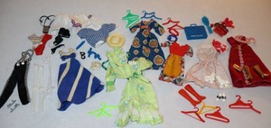lot 83 image: Vintage Barbie Clothes, Sporting Accessories Etc