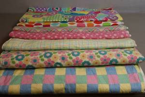 lot 127 image: Assorted Childrens Soft Flannel Fabrics for Baby Girl Blankets, Bibs, Doll Clothes Etc