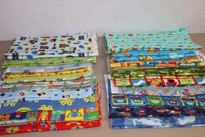 lot 130 image: Assorted Childrens Soft Flannel Fabrics Cut, Pre-Washed and Ready for More Bibs, Doll Clothes Etc