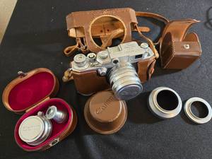 lot 39 image: Cannon 35 mm Camera With Filter & Extra Lens